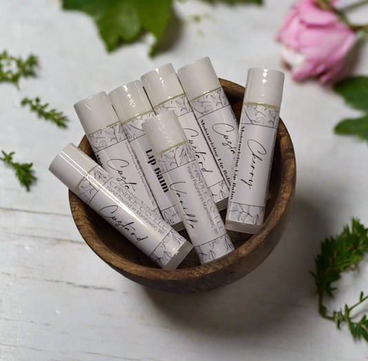 100% Organic Beeswax, Organic Virgin Coconut Oil, Organic Shea Butter, Organic Jojoba Oil, Organic Sweet Almond Oil, and Organic Castor Oil. - Moisturizing Lip Balm